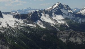 A mountain peak covered with snow in the Sawtooth-Chelan Wilderness